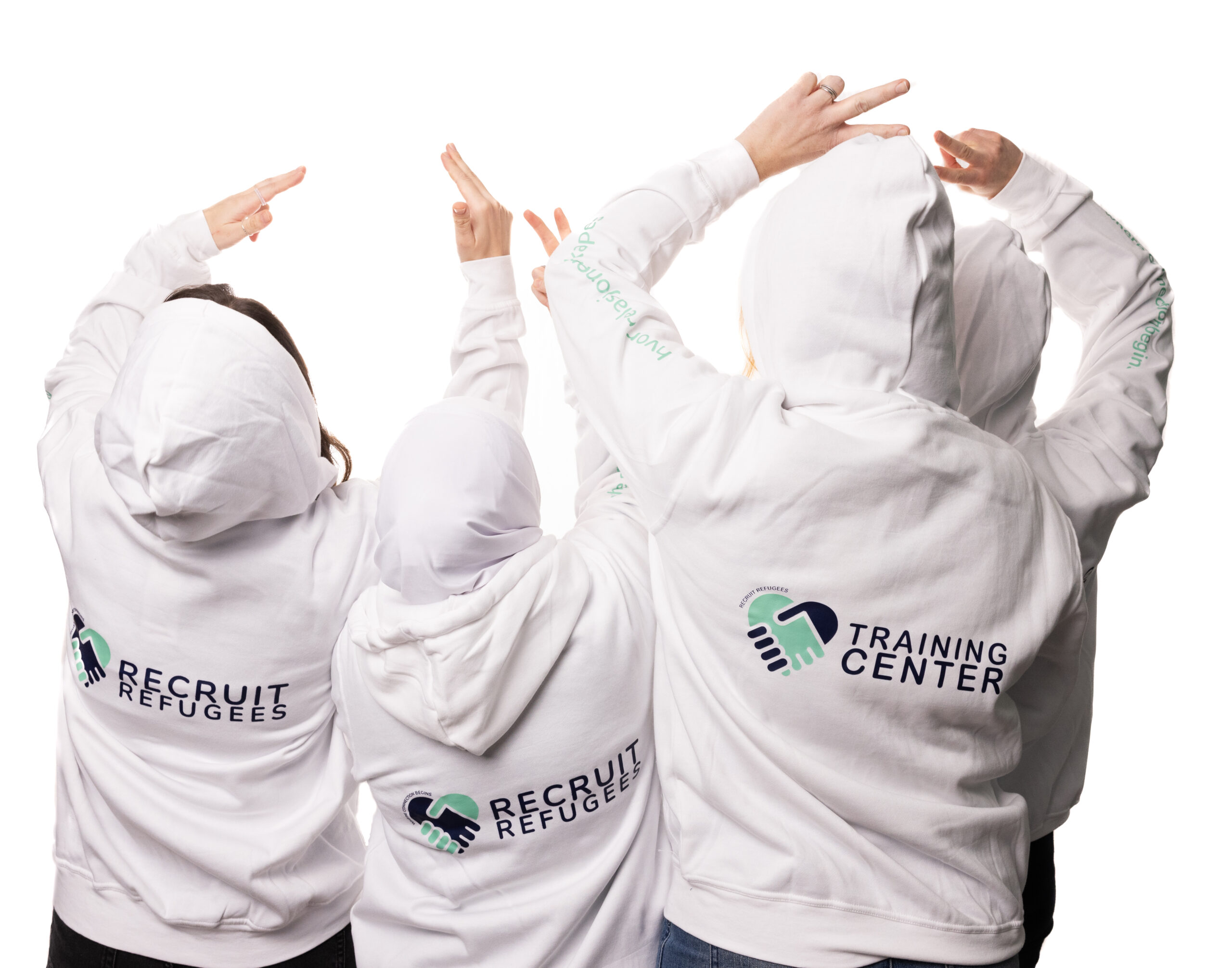 Recruit Refugees team members wearing organisation hoodies